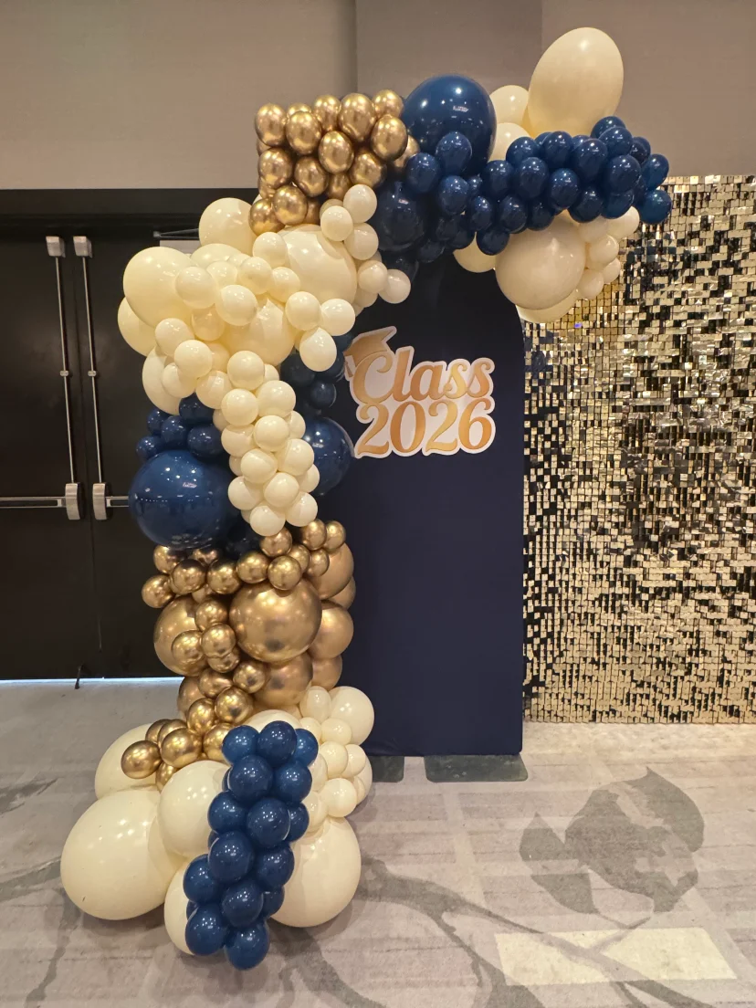 graduation party in Miami with tent, BBQ catering and photo backdrop — 1