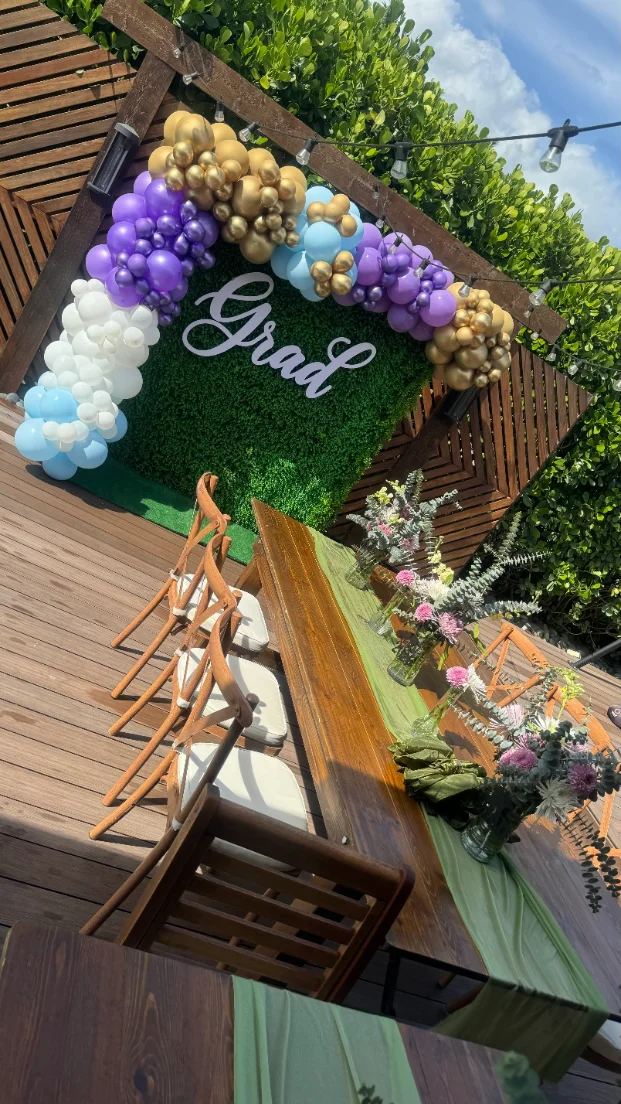 graduation party in Miami with tent, BBQ catering and photo backdrop — 3