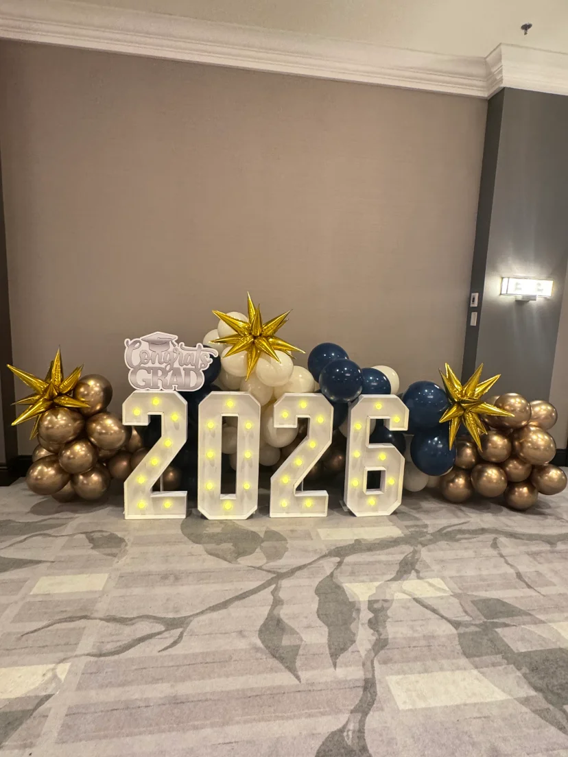 graduation party in Miami with tent, BBQ catering and photo backdrop — 4