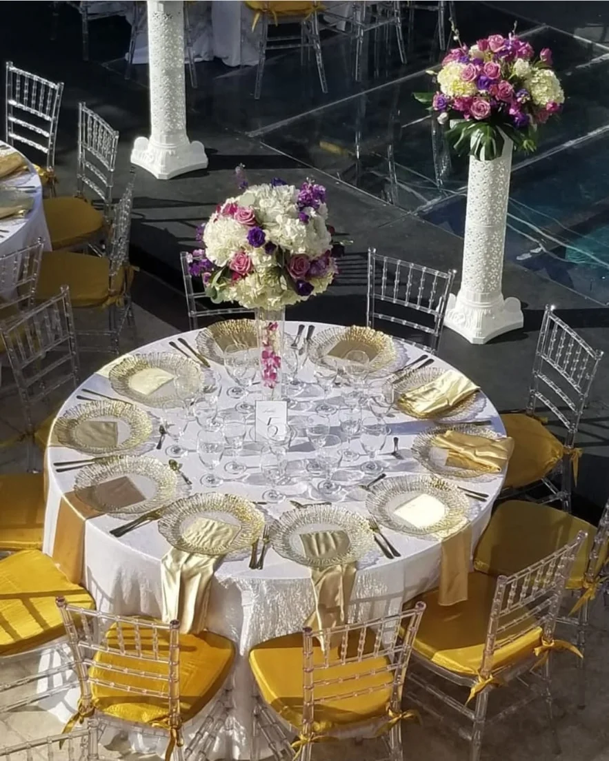 wedding reception with enclosed tent, floral backdrop and full table setup in Miami — 4