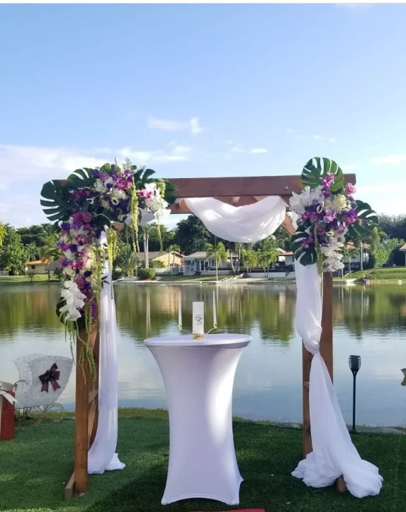 Elegant wedding reception tablescape with florals and linens in Miami